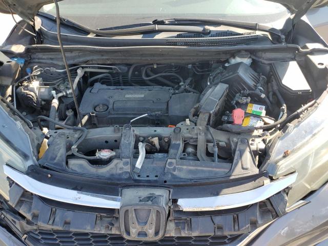 Photo 11 from auction – 2016 HONDA CR-V SE with VIN 2HKRM3H46GH554404