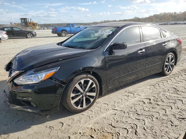 NISSAN ALTIMA 2.5 2017 with VIN 1N4AL3AP5HC117596 - Photo from auction