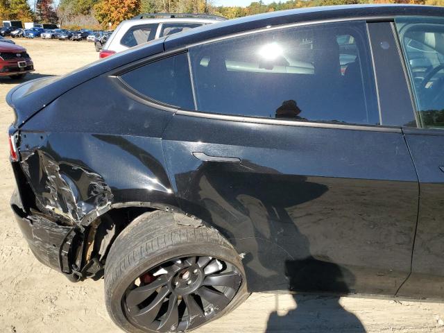 Photo 11 from auction – 2022 TESLA MODEL Y with VIN 7SAYGDEF0NF572135