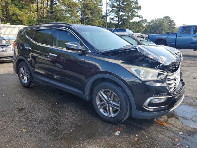 Photo 4 from auction – 2017 HYUNDAI SANTA FE S with VIN 5NMZU3LB0HH014101