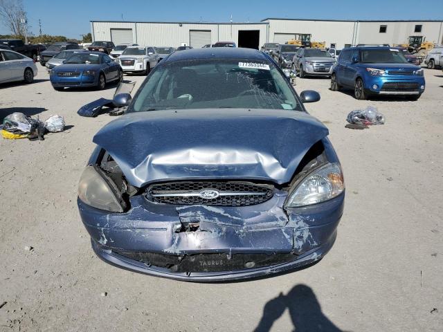 Photo 5 from auction – 2000 FORD TAURUS SE with VIN 1FAFP53U3YG259124