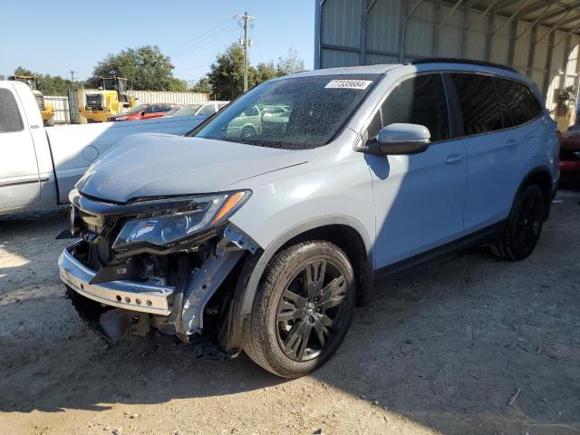 HONDA PILOT SE 2022 with VIN 5FNYF5H2XNB018003 - Photo from auction