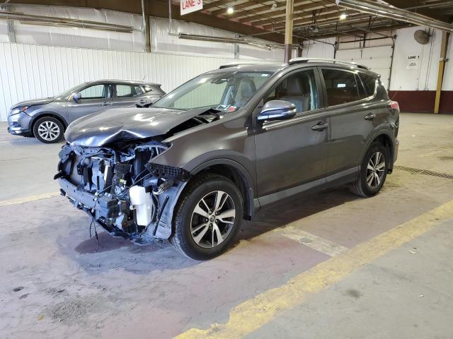 TOYOTA RAV4 XLE 2017 with VIN JTMRFREV1HJ154673 - Photo from auction