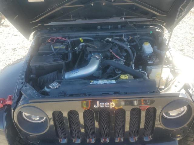 Photo 12 from auction – 2011 JEEP WRANGLER U with VIN 1J4HA5H15BL512147