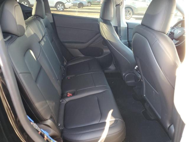 Photo 11 from auction – 2024 TESLA MODEL Y with VIN 7SAYGDEE4RF990565