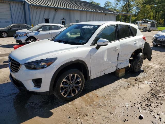 MAZDA CX-5 GT 2016 with VIN JM3KE4DY0G0864551 - Photo from auction