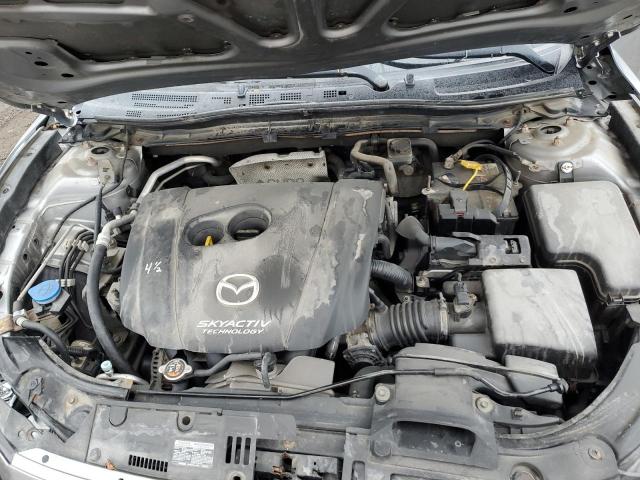 Photo 11 from auction – 2014 MAZDA 3 SPORT with VIN JM1BM1U74E1107158