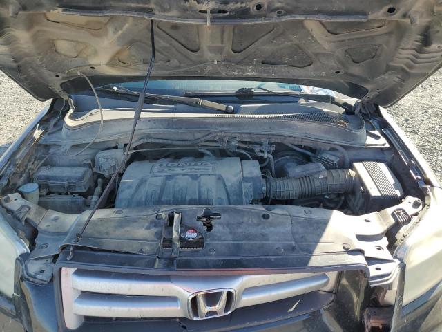 Photo 11 from auction – 2006 HONDA PILOT EX with VIN 2HKYF18526H540808