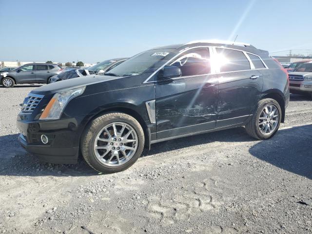 CADILLAC SRX PREMIU 2014 with VIN 3GYFNDE37ES522091 - Photo from auction