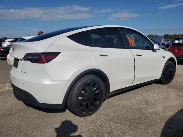 Photo 3 from auction – 2023 TESLA MODEL Y with VIN 7SAYGDEE1PA060777