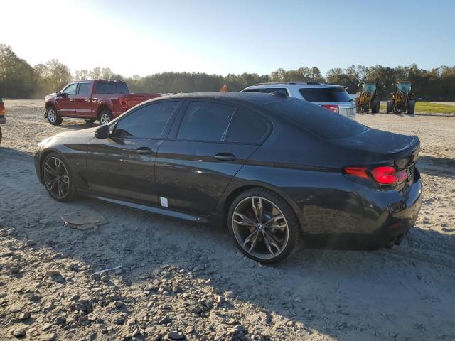 Photo 2 from auction – 2021 BMW M550XI with VIN WBA13BK04MCF56093