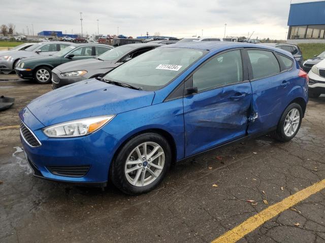 FORD FOCUS SE 2018 with VIN 1FADP3K26JL277173 - Photo from auction