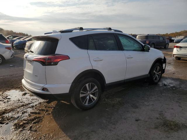 Photo 3 from auction – 2016 TOYOTA RAV4 XLE with VIN 2T3RFREV7GW532575