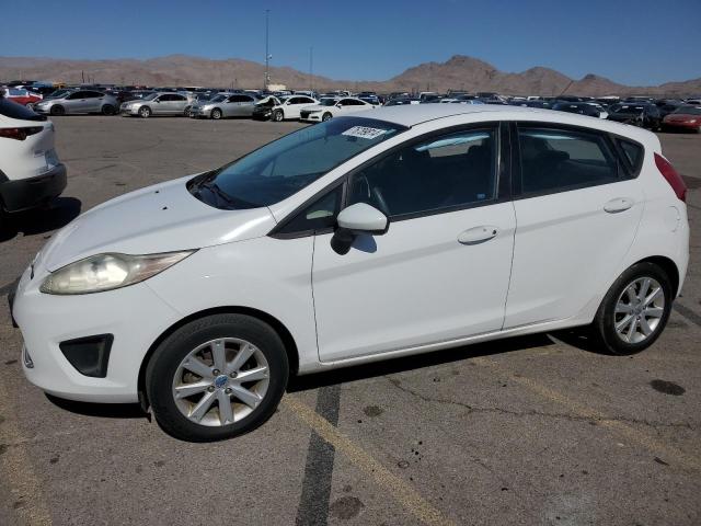 FORD FIESTA SE 2011 with VIN 3FADP4EJ4BM164203 - Photo from auction