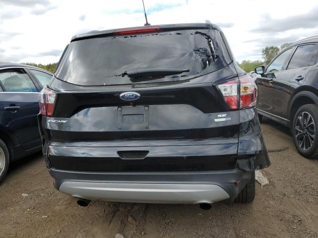 Photo 6 from auction – 2018 FORD ESCAPE SE with VIN 1FMCU9GDXJUB15791