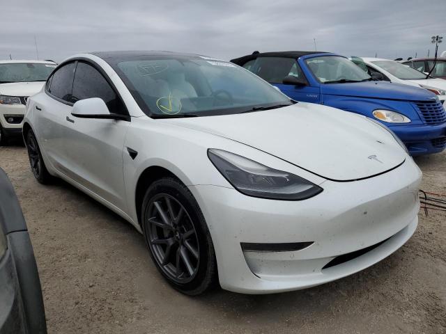 Photo 4 from auction – 2021 TESLA MODEL 3 with VIN 5YJ3E1EA4MF029398
