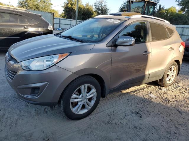 HYUNDAI TUCSON GLS 2012 with VIN KM8JUCAC1CU451465 - Photo from auction
