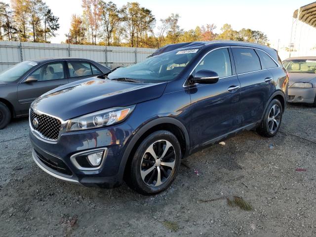 KIA SORENTO EX 2016 with VIN 5XYPH4A13GG029809 - Photo from auction