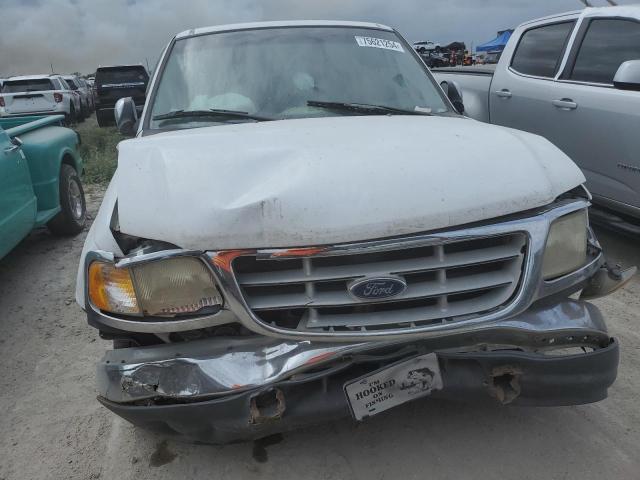 Photo 5 from auction – 1999 FORD F150 with VIN 1FTRX17W0XNA86913