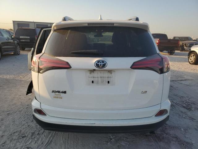Photo 6 from auction – 2018 TOYOTA RAV4 LE with VIN JTMZFREV3JJ171433