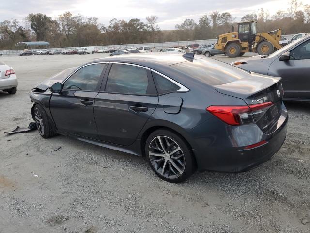 Photo 2 from auction – 2023 HONDA CIVIC TOUR with VIN 2HGFE1F99PH306502