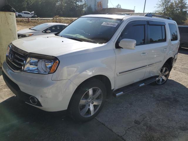 HONDA PILOT TOUR 2014 with VIN 5FNYF4H93EB052422 - Photo from auction