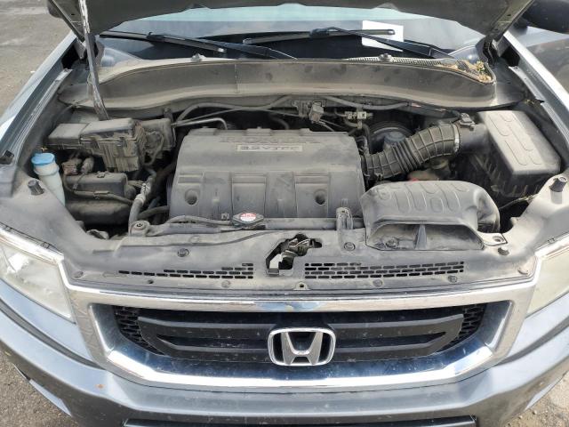 Photo 11 from auction – 2010 HONDA RIDGELINE with VIN 5FPYK1F25AB007595