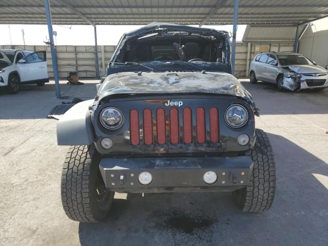 Photo 5 from auction – 2014 JEEP WRANGLER U with VIN 1C4BJWDG3EL223770