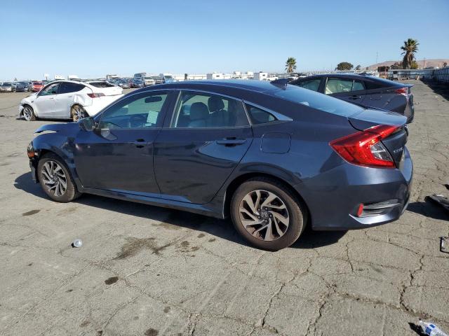 Photo 2 from auction – 2018 HONDA CIVIC EX with VIN 2HGFC2F70JH571732