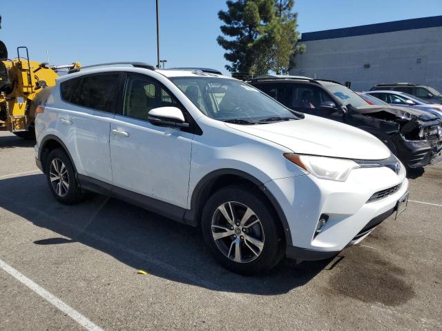 Photo 4 from auction – 2016 TOYOTA RAV4 XLE with VIN JTMWFREV5GD082277