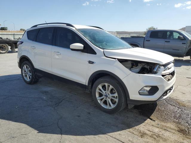 Photo 4 from auction – 2018 FORD ESCAPE SE with VIN 1FMCU9GD8JUB11948