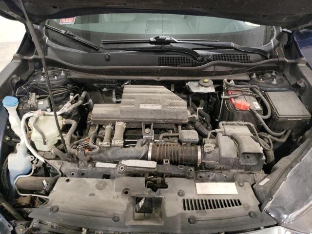 Photo 12 from auction – 2017 HONDA CR-V EX with VIN 2HKRW2H56HH665291