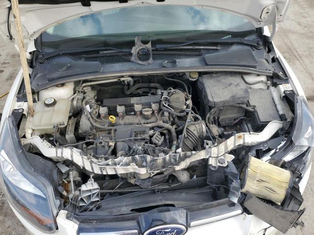 Photo 11 from auction – 2013 FORD FOCUS TITA with VIN 1FADP3J26DL105652