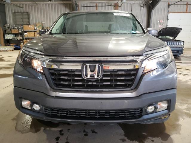Photo 5 from auction – 2017 HONDA RIDGELINE with VIN 5FPYK3F50HB032033