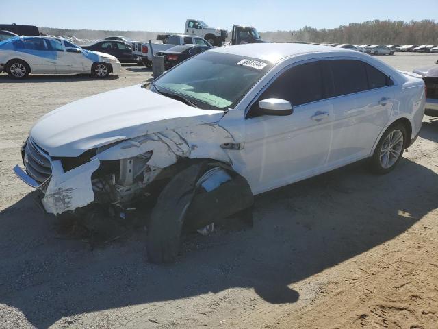 FORD TAURUS SEL 2013 with VIN 1FAHP2E81DG176552 - Photo from auction