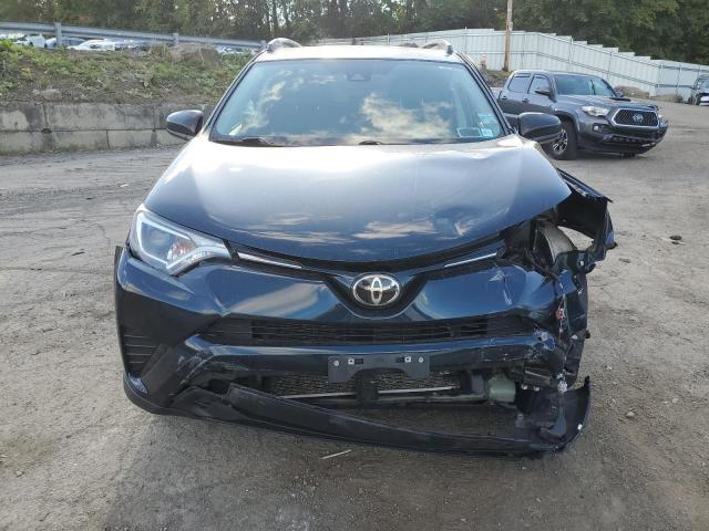 Photo 5 from auction – 2018 TOYOTA RAV4 LE with VIN 2T3BFREV6JW835355
