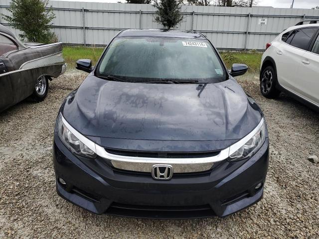 Photo 5 from auction – 2018 HONDA CIVIC EX with VIN JHMFC1F37JX039670