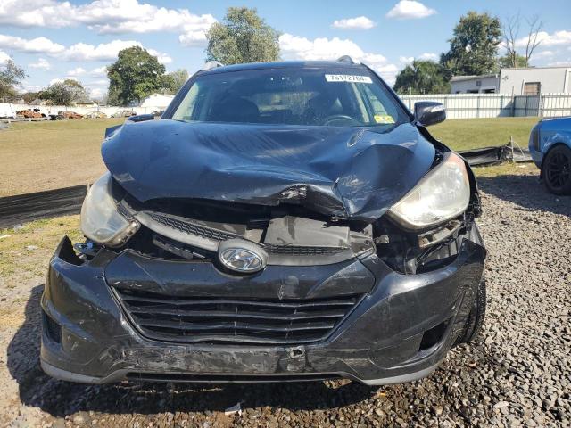 Photo 5 from auction – 2012 HYUNDAI TUCSON GLS with VIN KM8JUCACXCU542007