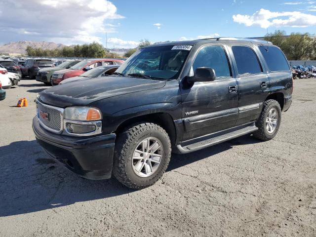 GMC YUKON 2001 with VIN 1GKEC13T81R143644 - Photo from auction