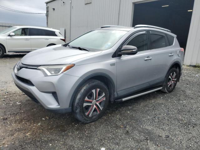 TOYOTA RAV4 LE 2016 with VIN 2T3ZFREV7GW244393 - Photo from auction