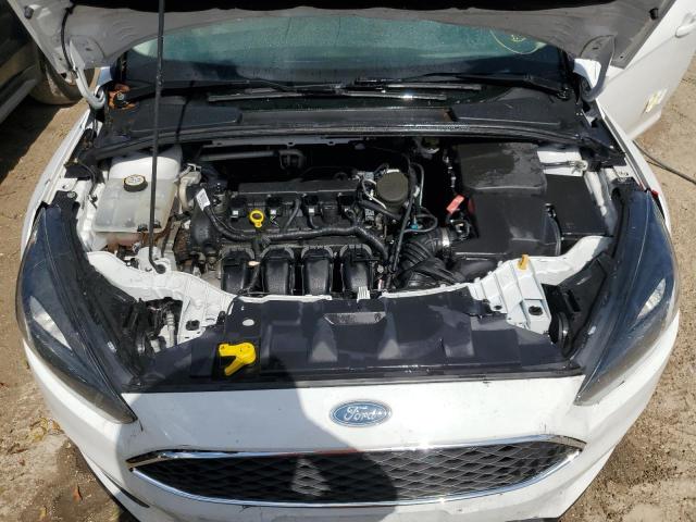 Photo 11 from auction – 2015 FORD FOCUS SE with VIN 1FADP3F2XFL279896