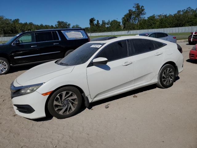 HONDA CIVIC EX 2017 with VIN 19XFC2F72HE064982 - Photo from auction