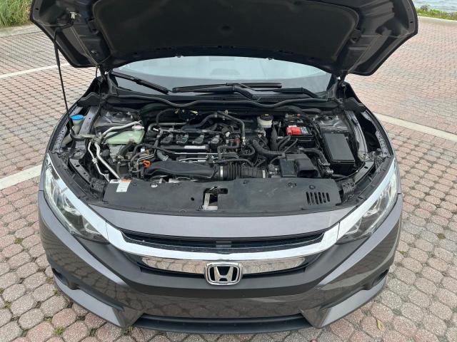 Photo 7 from auction – 2018 HONDA CIVIC EX with VIN JHMFC1F3XJX037556