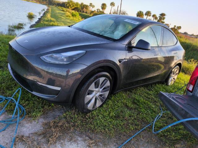 TESLA MODEL Y 2024 with VIN 7SAYGDEE3RA252026 - Photo from auction
