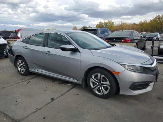 Photo 4 from auction – 2016 HONDA CIVIC LX with VIN 19XFC2F59GE033628