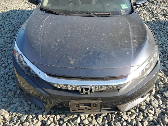 Photo 11 from auction – 2018 HONDA CIVIC EX with VIN JHMFC1F35JX032393