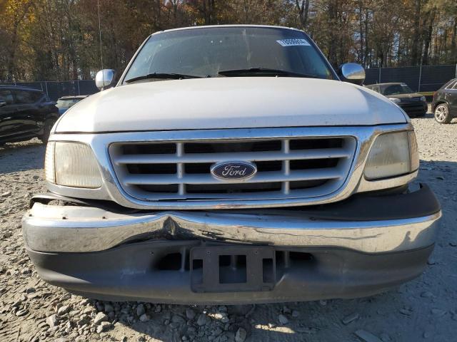 Photo 5 from auction – 1999 FORD F150 with VIN 1FTRX17W5XNA87569