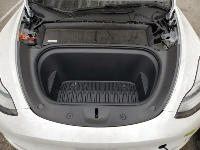 Photo 11 from auction – 2023 TESLA MODEL Y with VIN 7SAYGDEE5PA128286