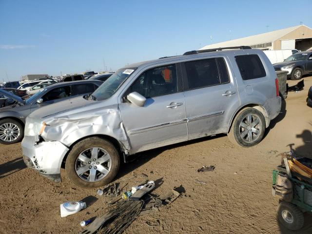HONDA PILOT TOUR 2014 with VIN 5FNYF4H95EB016960 - Photo from auction