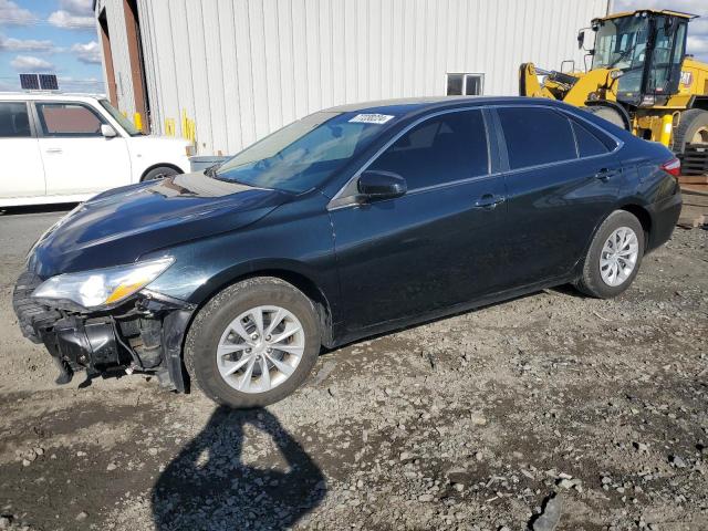 TOYOTA CAMRY LE 2015 with VIN 4T1BF1FK0FU932573 - Photo from auction